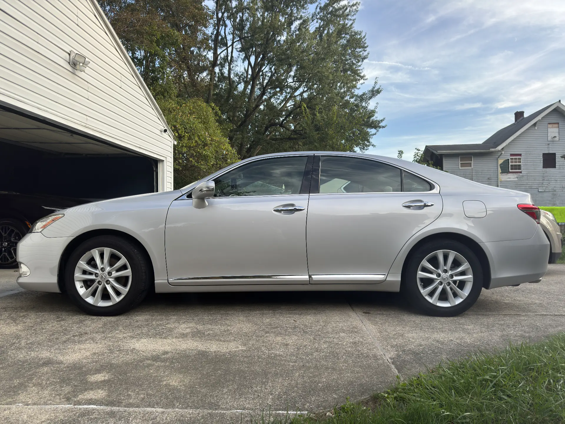 Silver Lexus ES sedan after a full auto detail with a glossy finish