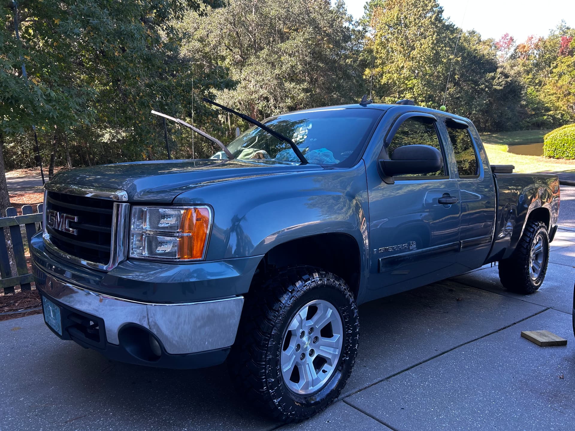 Blue GMC Sierra pickup truck after a full exterior detail